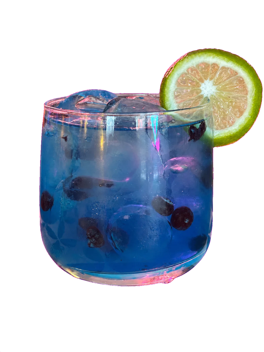 A bright-blue mocktail with blueberries, ice, and a lime wheel.
